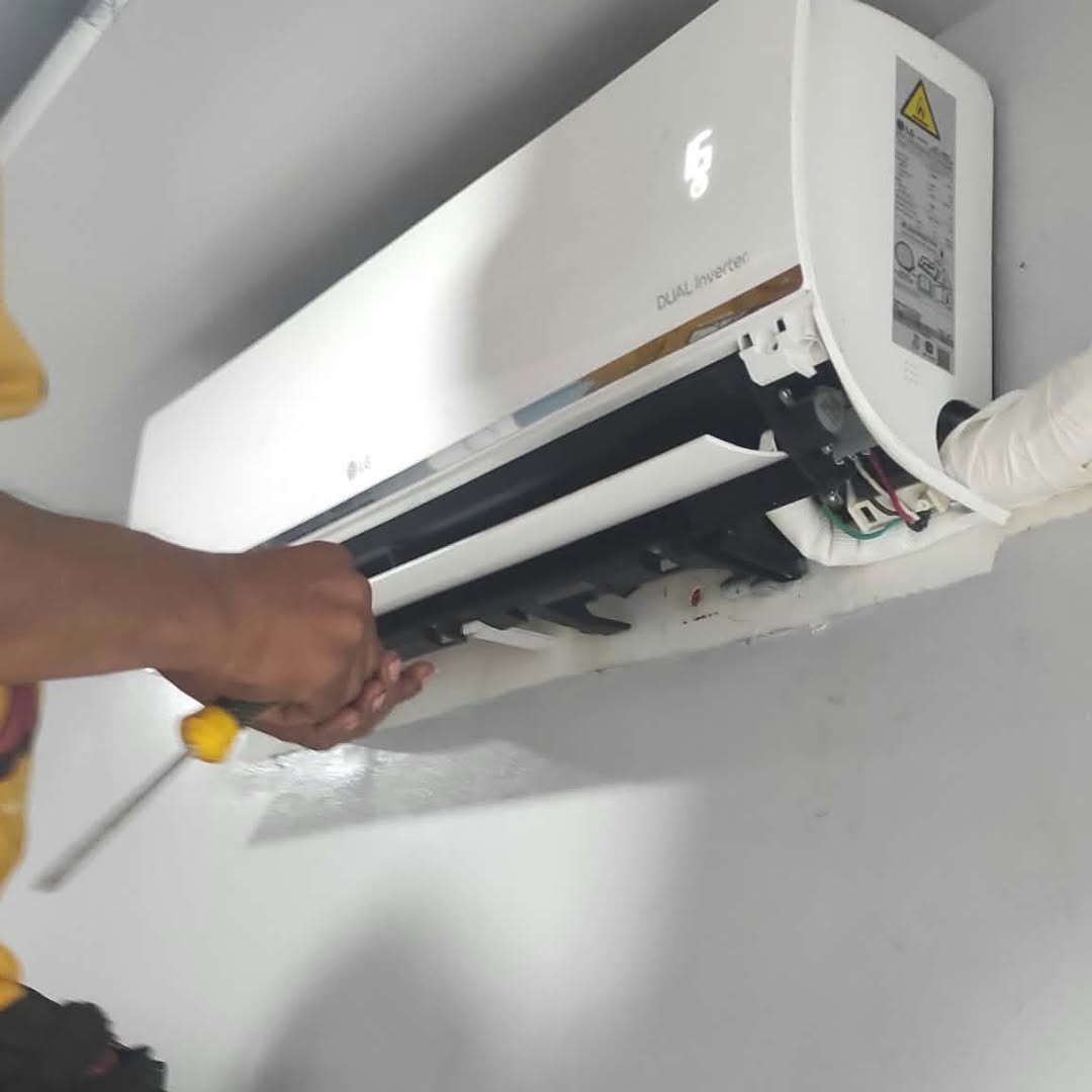 Aircon unit mounted near ceiling after cleaning